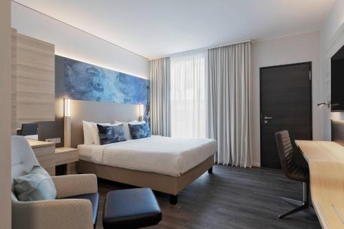 Habitación Superior - Cama grande del hotel Courtyard by Marriott Munich Garching