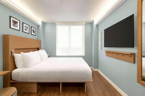 Habitación Deluxe - Cama grande - No Fumadores del hotel Wingate By Wyndham Bronx/haven Park