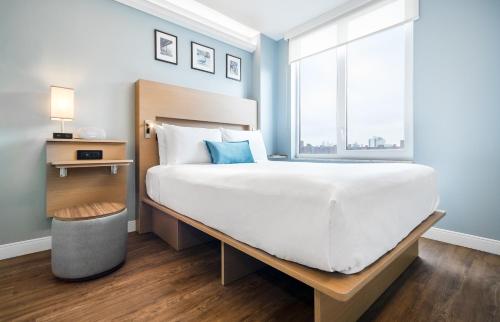 Habitación Deluxe - Cama grande - No Fumadores del hotel Wingate By Wyndham Bronx/haven Park. Foto 5