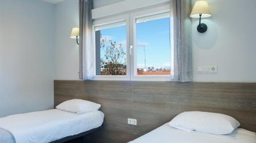 Habitación Doble - 2 camas del hotel Golden Alcalá. Foto 6