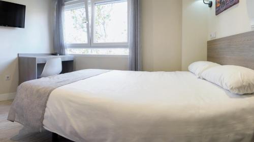 Habitación Doble Estándar del hotel Golden Alcalá. Foto 3