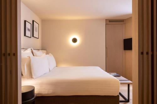 Habitación Deluxe del hotel HÔtel EstÉ. Foto 5