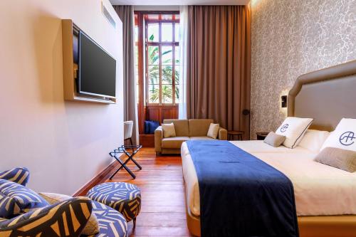 Habitación Deluxe del hotel Boutique Cordial Plaza Mayor de Santa Ana. Foto 2