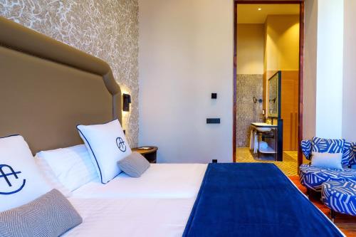 Habitación Deluxe del hotel Boutique Cordial Plaza Mayor de Santa Ana. Foto 3