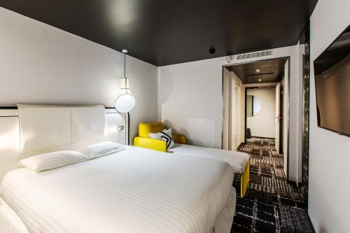 Habitación Triple Deluxe del hotel Ekta. Foto 3
