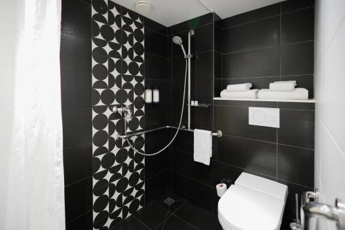 Habitación Triple Deluxe del hotel Ekta. Foto 4