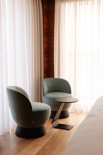 Suite Doble Deluxe con bañera de hidromasaje del hotel Mypalace LeÓn. Foto 3