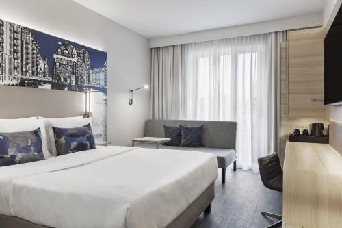 Habitación Familiar con sofá cama del hotel Courtyard by Marriott Hamburg City