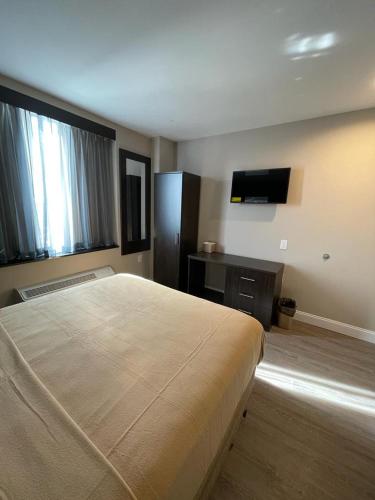 Habitación Doble Estándar del hotel Royal Bronx. Foto 1