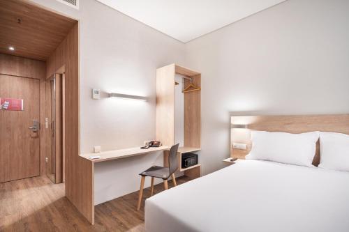 Habitación Doble Estándar del hotel Moov Oeiras. Foto 1