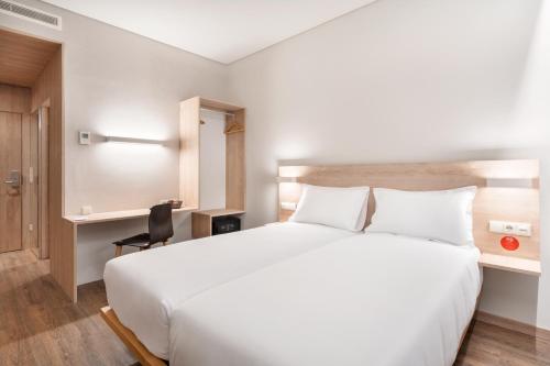 Habitación Doble Estándar - 2 camas del hotel Moov Oeiras. Foto 4