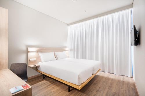 Habitación Doble Estándar - 2 camas del hotel Moov Oeiras. Foto 5