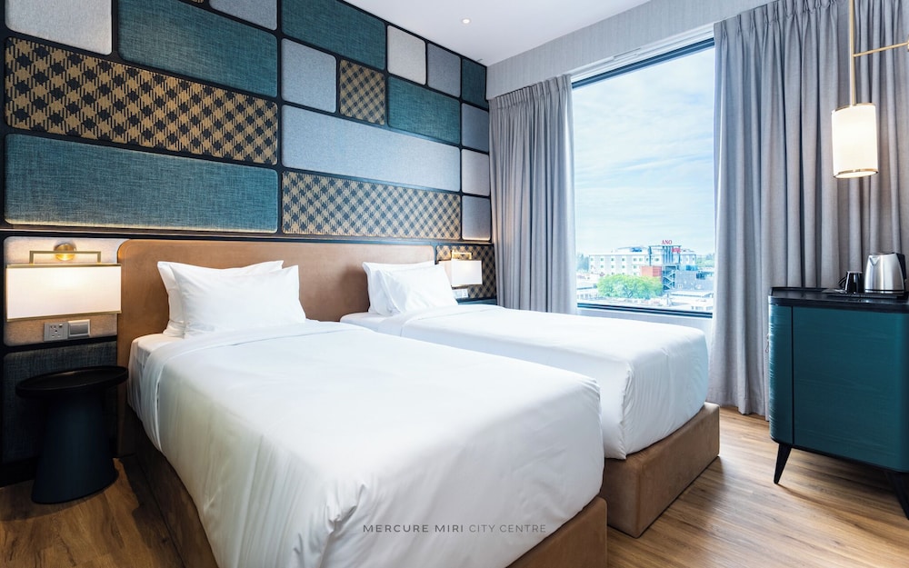 Habitación Deluxe con 2 camas individuales del hotel Mercure Miri City Centre. Foto 4