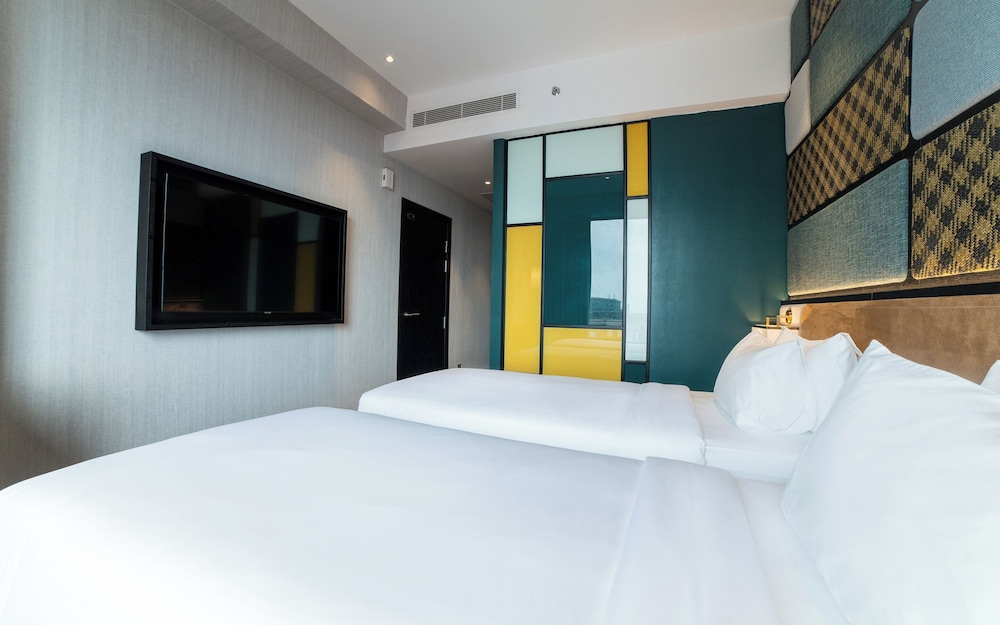 Habitación Privilege con 2 camas individuales del hotel Mercure Miri City Centre. Foto 3