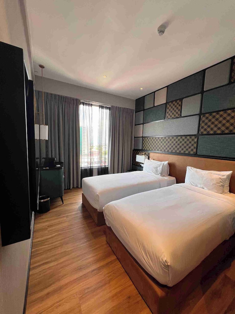Habitación Privilege con 2 camas individuales del hotel Mercure Miri City Centre. Foto 4