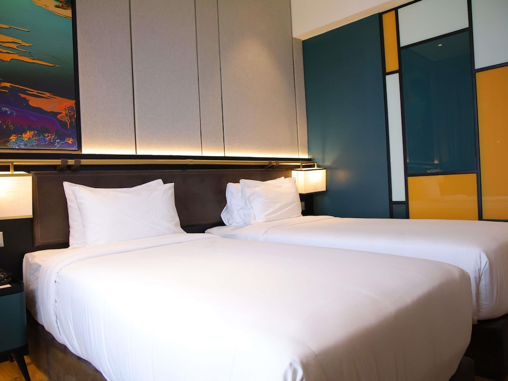 Habitación Privilege con 2 camas individuales del hotel Mercure Miri City Centre. Foto 5