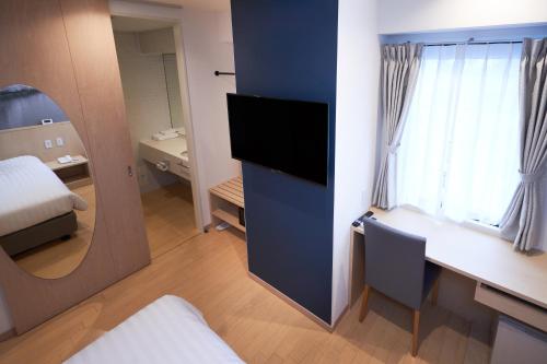 Habitación Individual Estándar del hotel Travelodge Honmachi Osaka. Foto 3