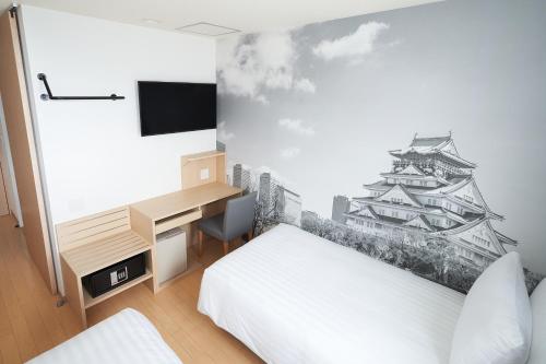 Habitación Doble Deluxe - 2 camas del hotel Travelodge Honmachi Osaka. Foto 4