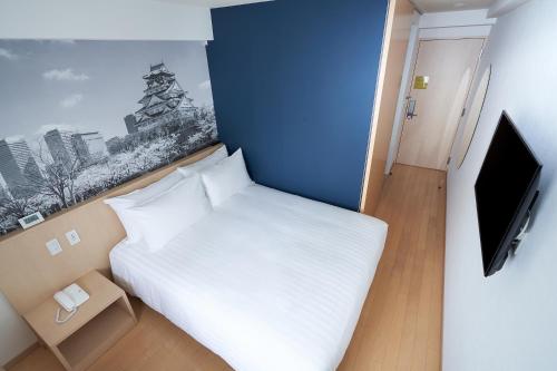Habitación Deluxe - 1 cama grande del hotel Travelodge Honmachi Osaka. Foto 1