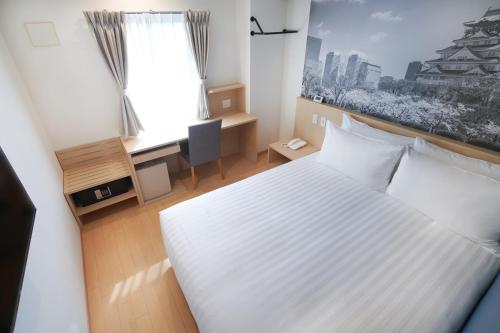 Habitación Deluxe - 1 cama grande del hotel Travelodge Honmachi Osaka. Foto 3