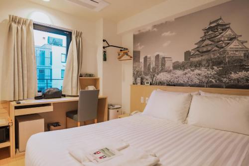 Habitación Deluxe - 1 cama grande del hotel Travelodge Honmachi Osaka. Foto 10