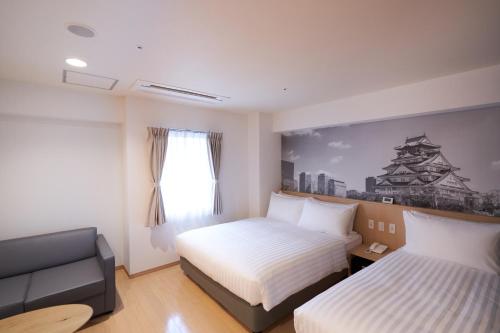 Habitación Familiar Deluxe del hotel Travelodge Honmachi Osaka. Foto 3