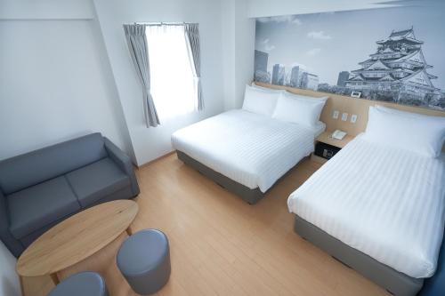 Habitación Familiar Deluxe del hotel Travelodge Honmachi Osaka. Foto 4