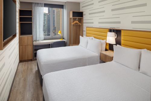 Habitación Doble con vistas a la ciudad del hotel Hampton Inn New York Times Square. Foto 2