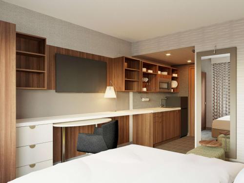 Suite Estudio con cama grande y vistas a la ciudad del hotel Home2 Suites By Hilton New York Times Square. Foto 2