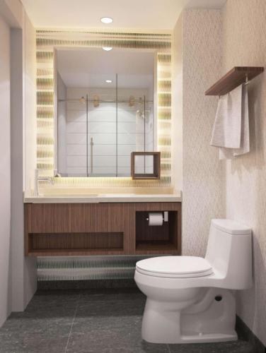 Estudio Esquinero con cama grande y vistas al agua del hotel Home2 Suites By Hilton New York Times Square. Foto 1