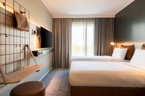 Habitación Doble Moxy - 2 camas del hotel Moxy Paris Val D’europe. Foto 1