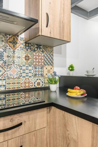 Habitación doble Interior 1 Cama king Vista Patio 2 sofás camas del hotel Open Sea Suites. Foto 26