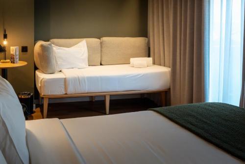 Habitación triple del hotel Acta The Clover. Foto 14