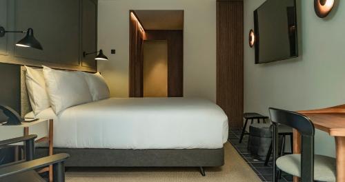 Habitación Deluxe del hotel Mercer Plaza Sevilla 5 Gl. Foto 1