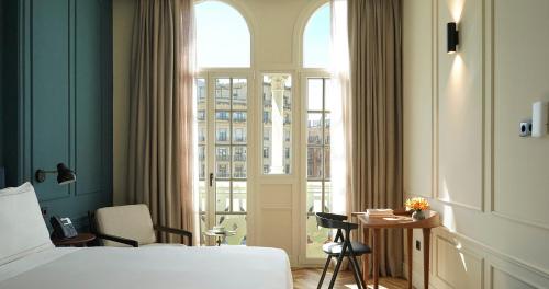 Habitación Doble Premium con Vistas del hotel Mercer Plaza Sevilla 5 Gl. Foto 2