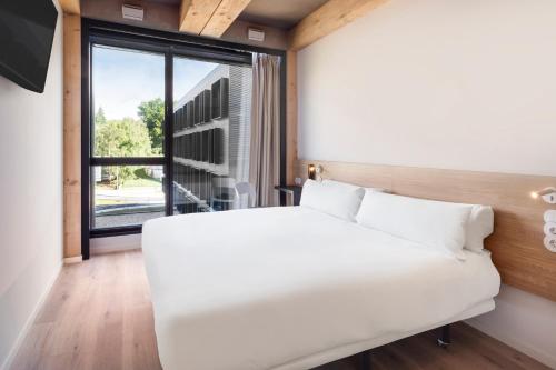 Habitación Doble Deluxe del hotel Bandb Guimarães. Foto 1