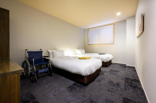 Habitación Doble adaptada para personas con discapacidad - 2 camas del hotel Wood Takayama. Foto 1