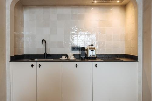 Suite con terraza del hotel Casa Del Rey Sabio. Foto 7