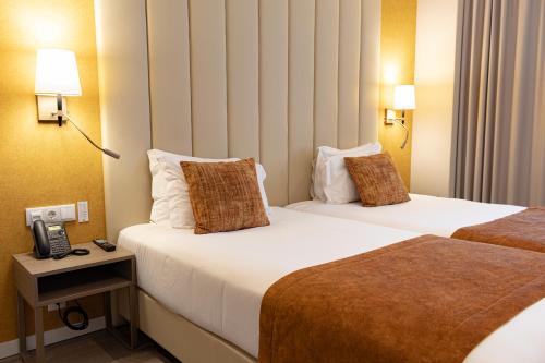 Habitación Doble Estándar - 1 o 2 camas del hotel MASA Wellness and Spa Campo Grande Lisboa. Foto 3