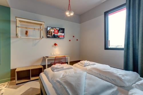 Habitación Doble - 2 camas del hotel MEININGER Paris Porte de Vincennes. Foto 3