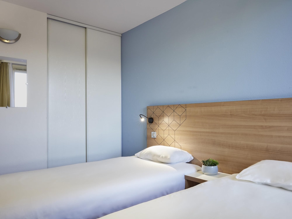 Apartamento con 2 camas individuales del hotel Adagio Access Paris Quai D'ivry. Foto 6