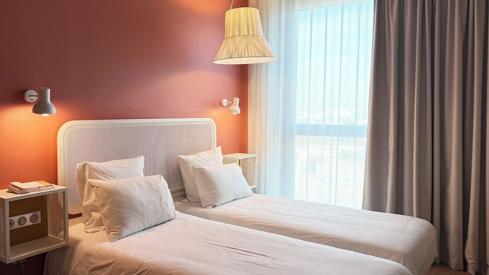 Habitación clásica con 2 camas individuales, 2 camas individuales del hotel Okko Hotels Paris Rosa Parks