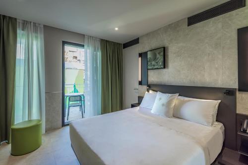 Habitación doble con balcón del hotel Palazzo Viridis. Foto 1