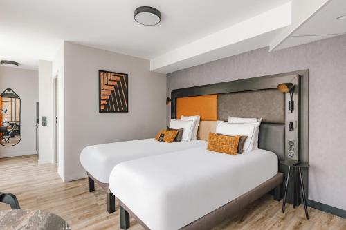 Estudio con 2 camas individuales del hotel Appart'city Collection Paris Gare De Lyon. Foto 1