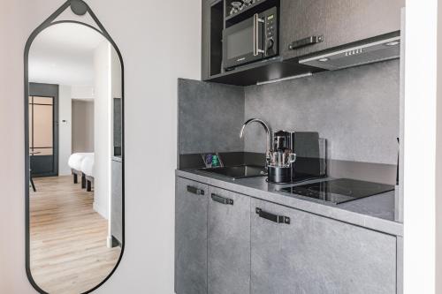 Estudio con 2 camas individuales del hotel Appart'city Collection Paris Gare De Lyon. Foto 3