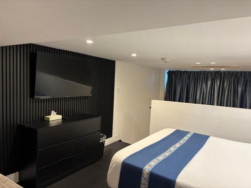 Estudio Deluxe con cama grande del hotel The Bogart By Luxurban, Trademark Collection By Wyndham. Foto 4