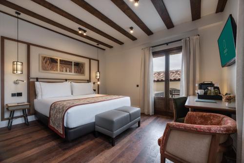 Habitación Deluxe con terraza del hotel Áurea Toledo. Foto 1