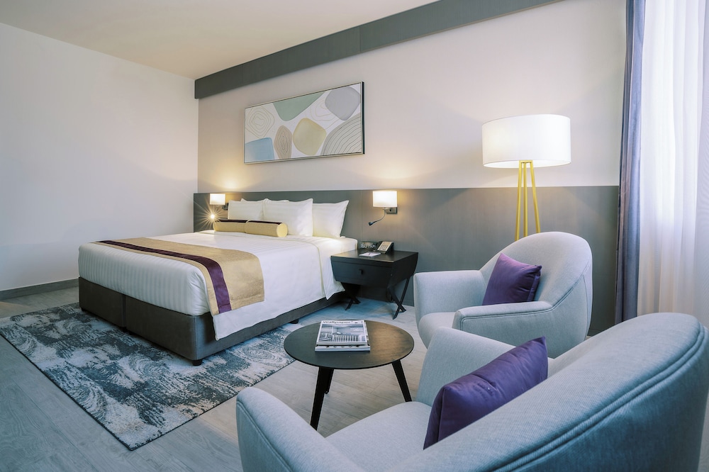 Habitación Deluxe, 1 cama de matrimonio grande del hotel Khalidia Palace Dubai. Foto 2