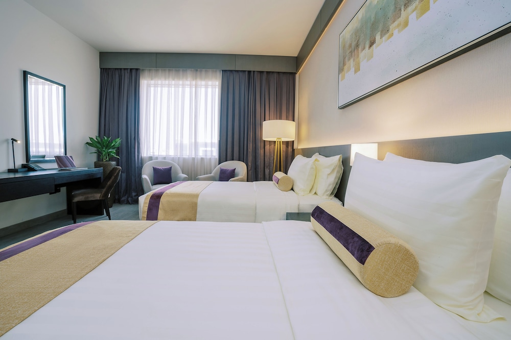 Habitación Deluxe con 2 camas individuales del hotel Khalidia Palace Dubai. Foto 1
