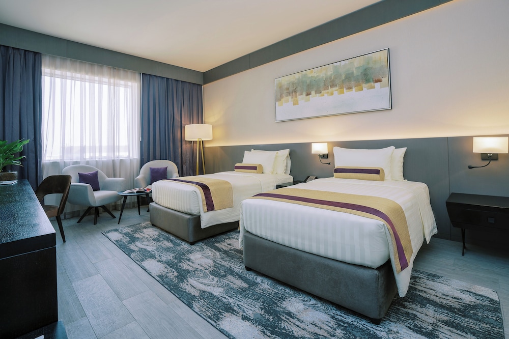 Habitación Deluxe con 2 camas individuales del hotel Khalidia Palace Dubai. Foto 2